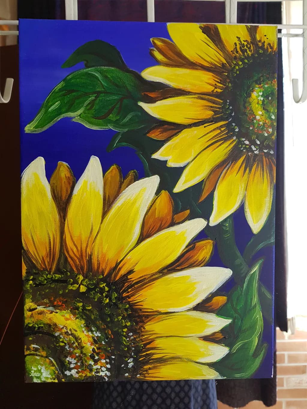 Sunlit Serenade: A Vibrant Dance of Sunflowers Against a Deep Blue Canvas