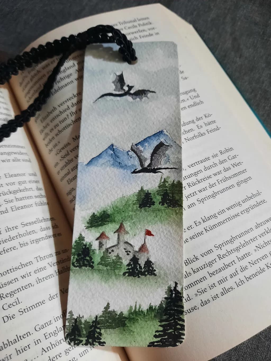 Whimsical Watercolor Bookmark: Enchanted Dragons Over a Serene Castle Landscape