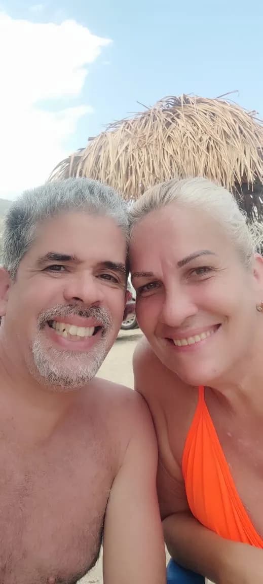 Sun-Kissed Smiles: A Joyful Moment by the Beach