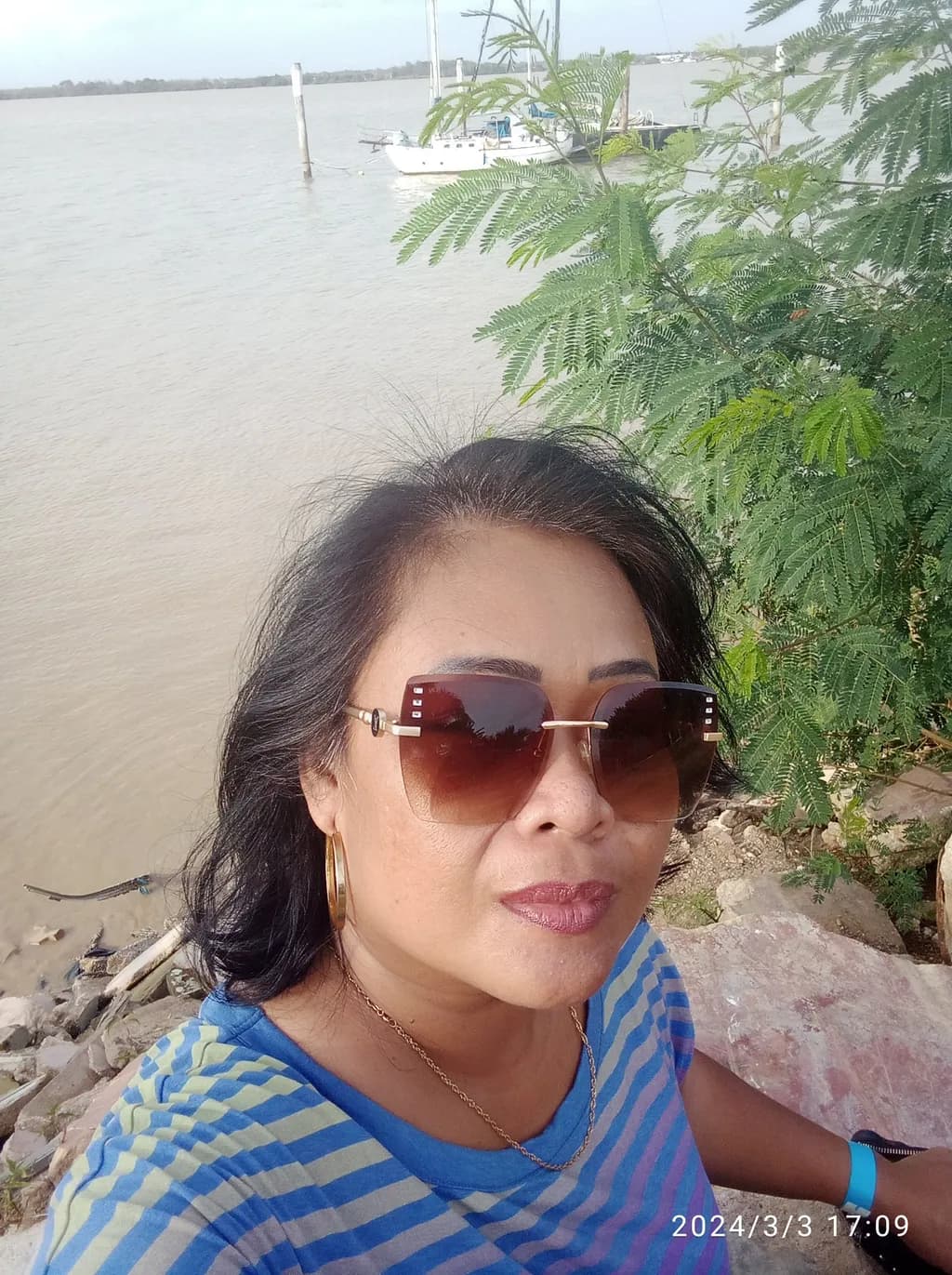 Serene Reflections: A Casual Portrait Amidst Nature's Embrace