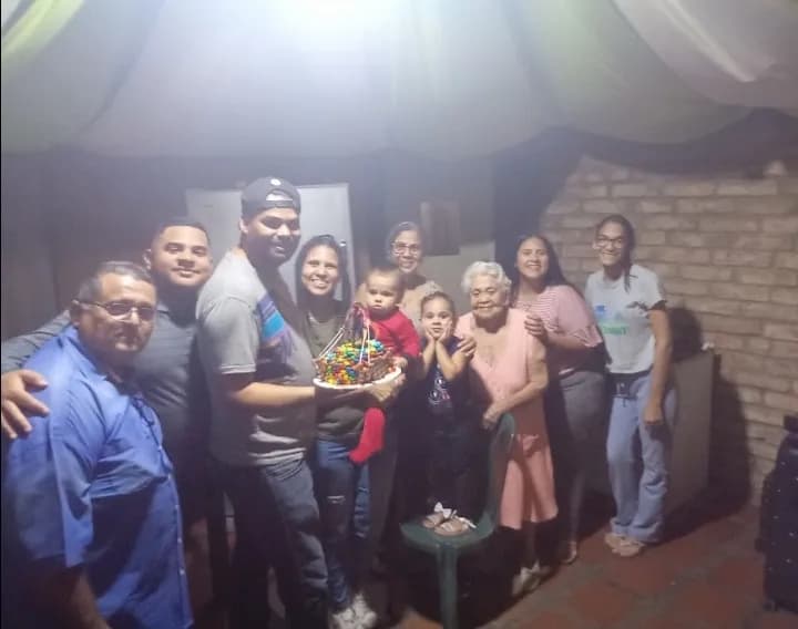 Celebrating Together: A Heartwarming Family Gathering in a Cozy Setting