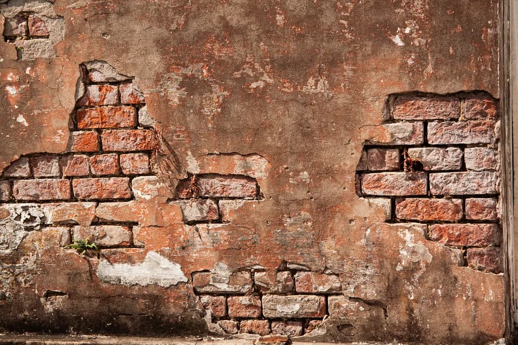 Urban Decay: The Beauty of Weathered Brick and Crumbling Walls