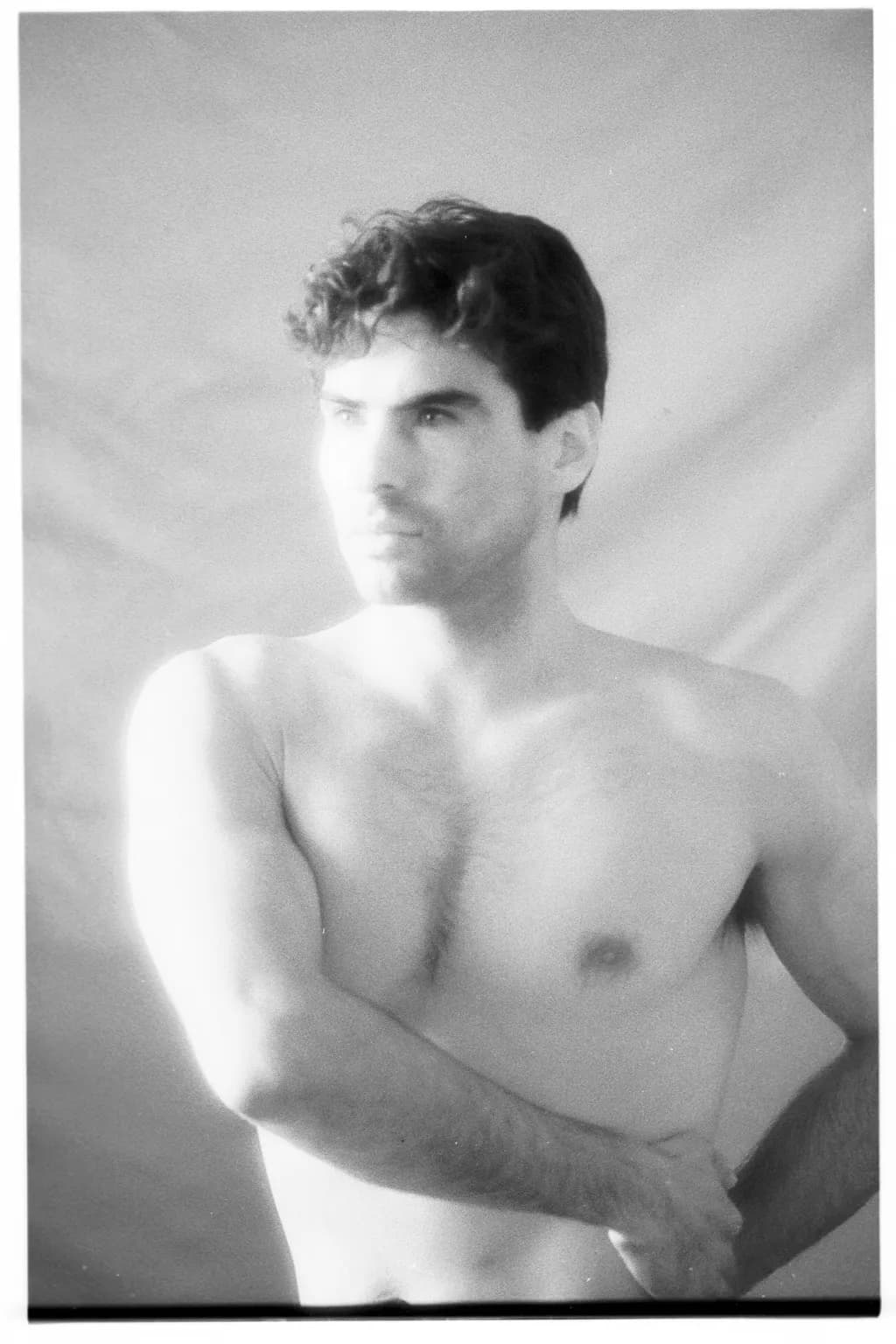 Ethereal Strength: A Monochrome Portrait of Masculine Grace
