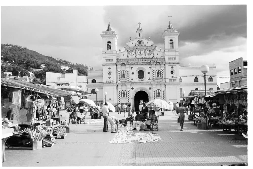 Market Serenity: A Black-and-White Journey Through Community and Architecture
