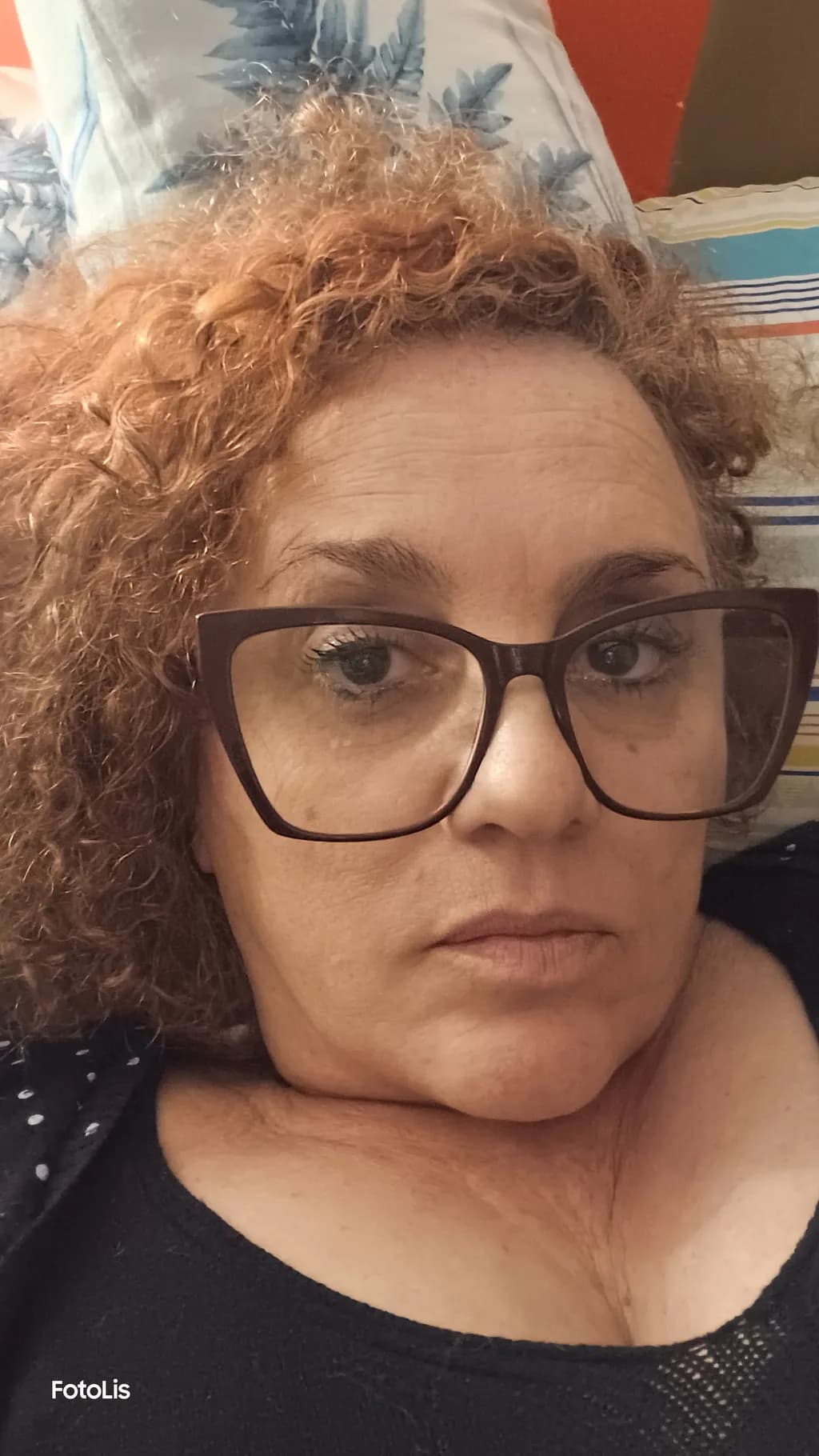 Curly Reflections: A Close-Up Portrait of Introspection and Style