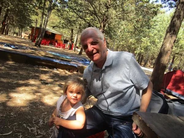 Cherished Moments: A Grandfather's Joy in Nature with His Grandchild