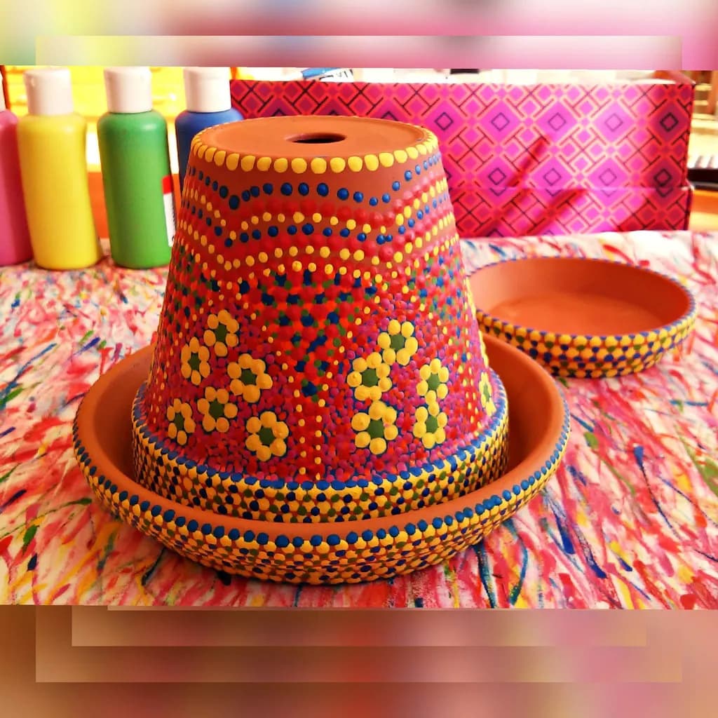 Vibrant Hand-Painted Terracotta Planter Set with Floral Motifs and Colorful Dots