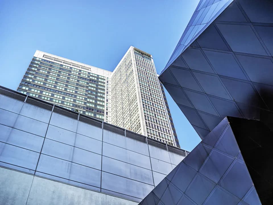 Urban Geometry: A Modern Skyscraper's Blue Perspective