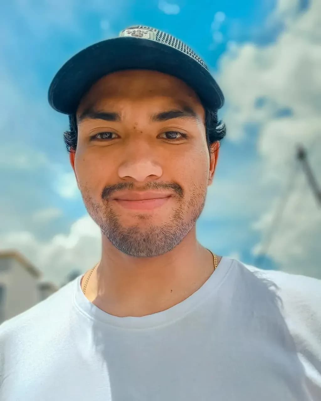 Sunny Smiles: A Casual Portrait Under the Open Sky