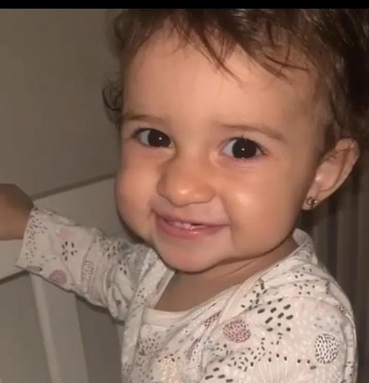 Joyful Innocence: A Cherubic Smile Captured in Time