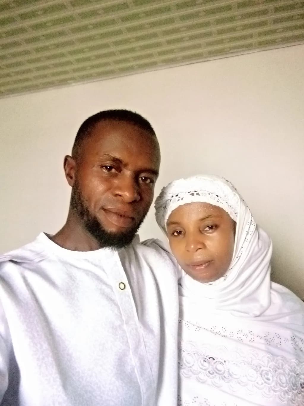 Eternal Smiles: A Portrait of Unity in Traditional Attire