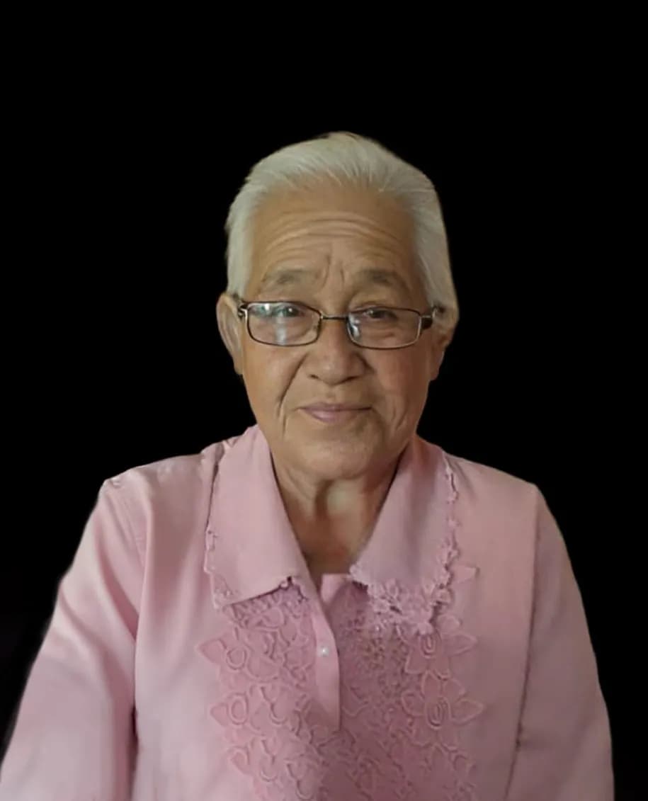 Serene Smiles: A Portrait of Wisdom in Pink