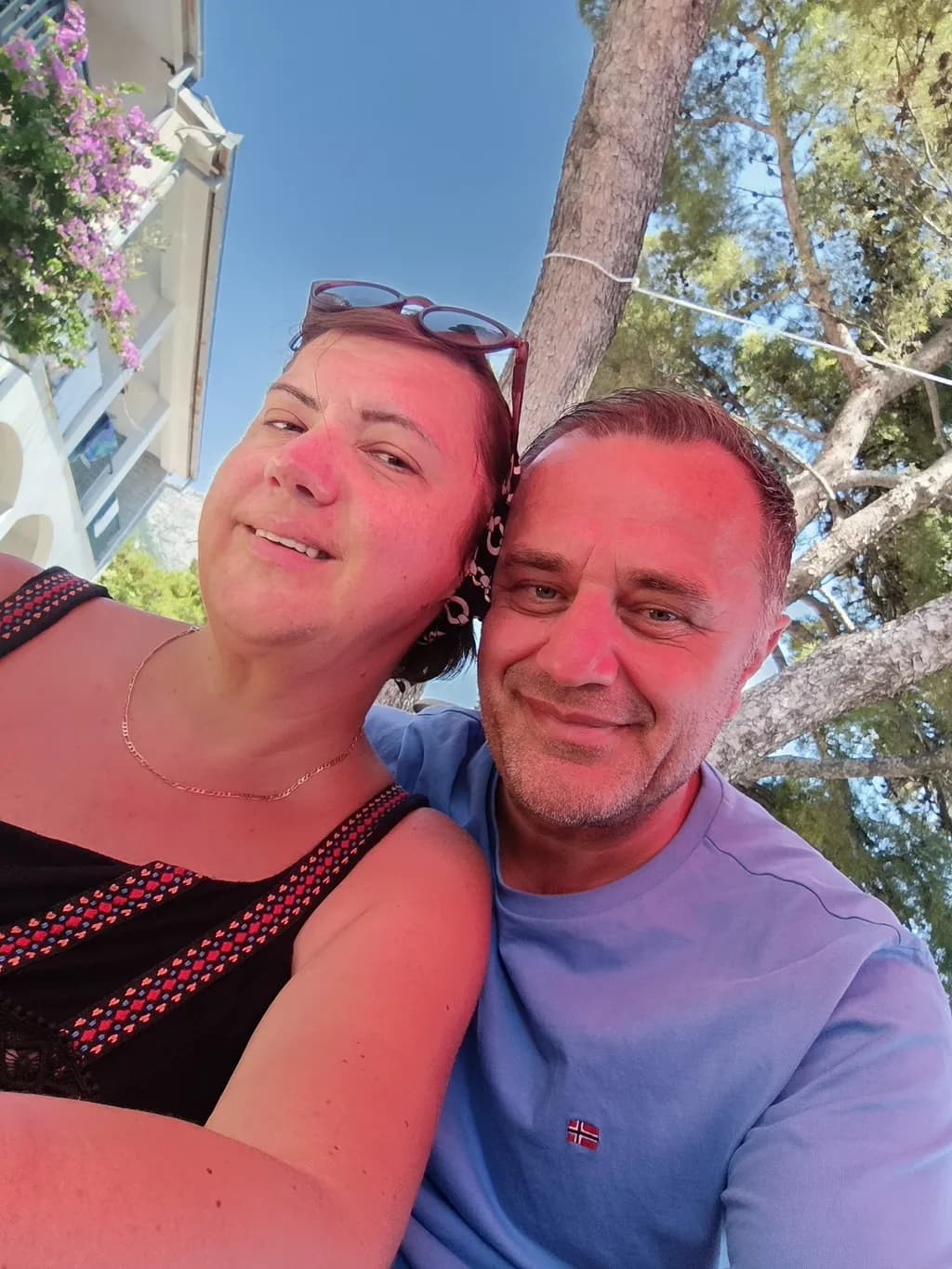 Sunlit Smiles: A Cherished Moment Under the Trees with Love and Laughter