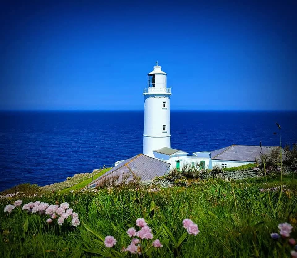 Guiding Light: A Serene Lighthouse by the Sea