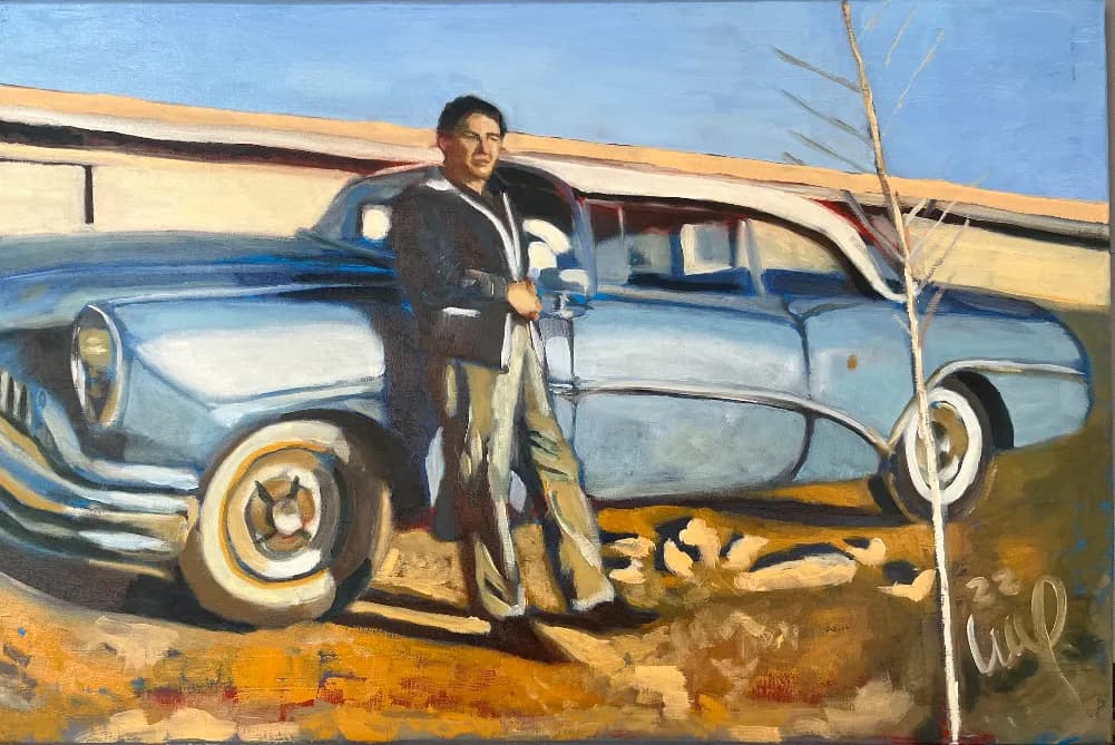 Timeless Journey: A Man and His Classic Car in a Sunlit Landscape