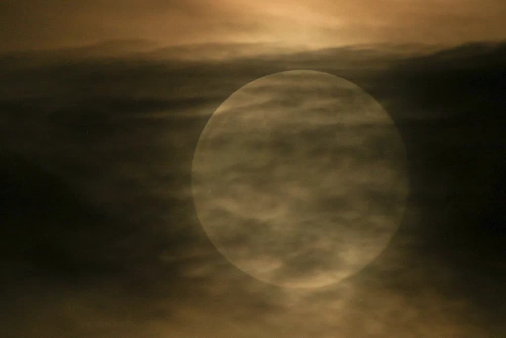 Moon Veiled in Clouds