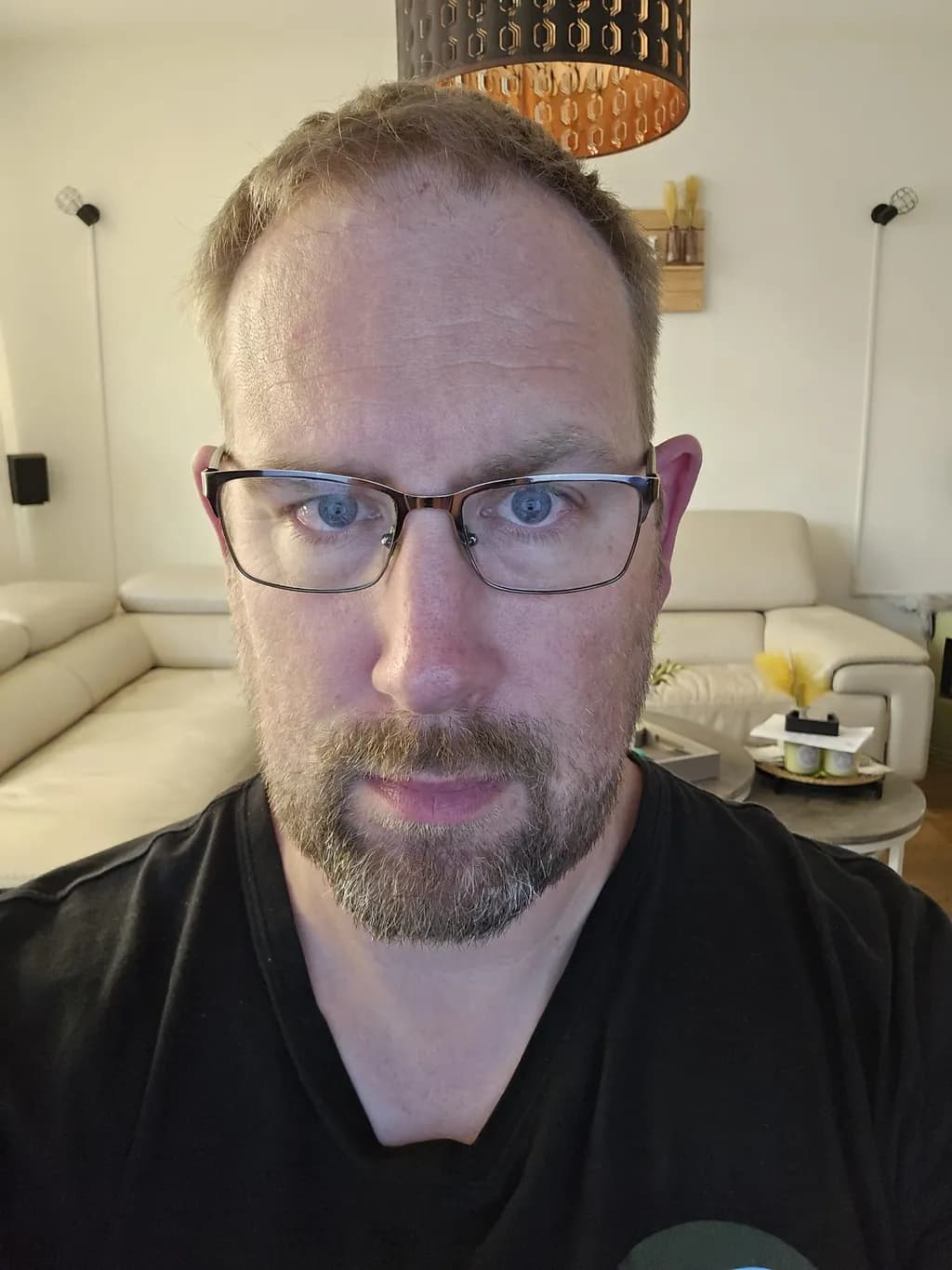 Focused Gaze: A Casual Portrait of Contemplation in a Modern Space