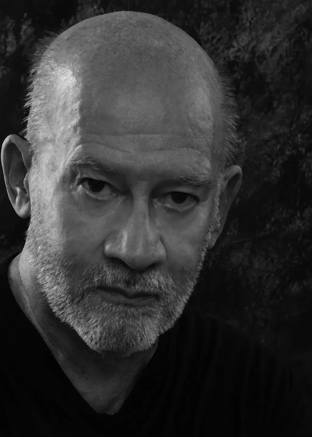 Intense Reflection: A Black and White Portrait of Age and Expression