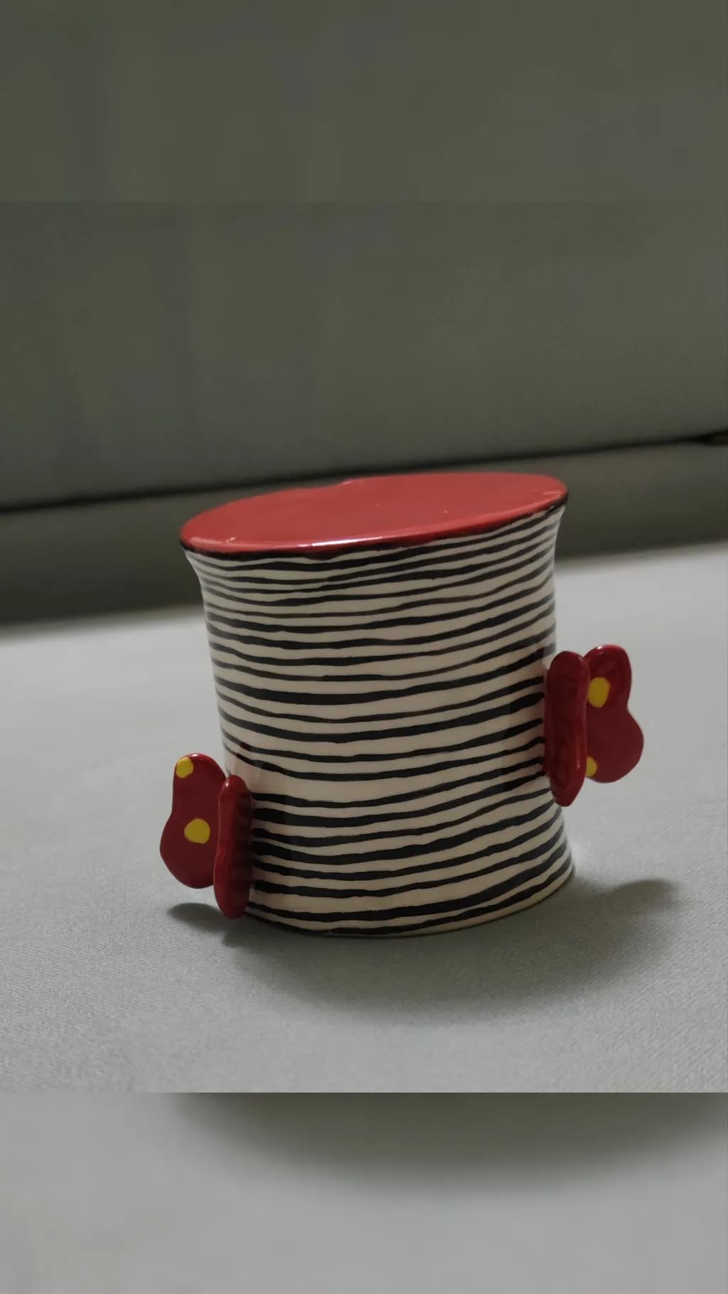 Whimsical Butterfly-Embellished Striped Ceramic Container: A Playful Touch for Your Home Decor