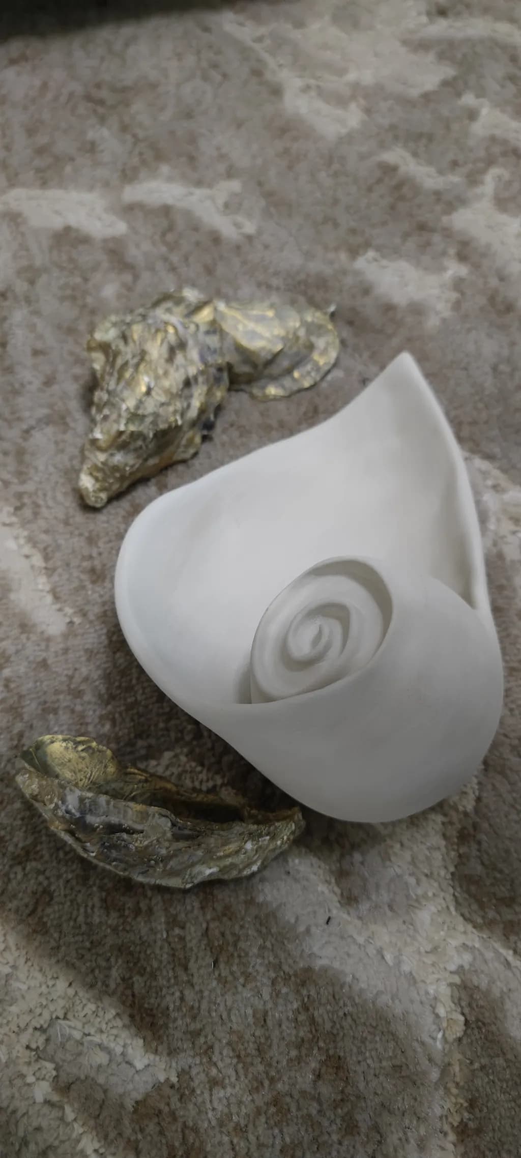 Whispers of the Sea: Elegant Ceramic Shell Sculpture with Textured Accents
