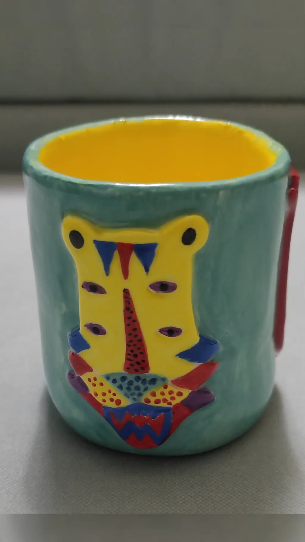 Vibrant Handcrafted Ceramic Mug with Unique Artistic Design
