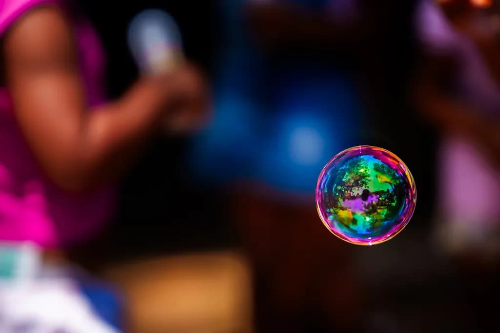 Whispers of Color: A Captivating Bubble's Dance in the Light