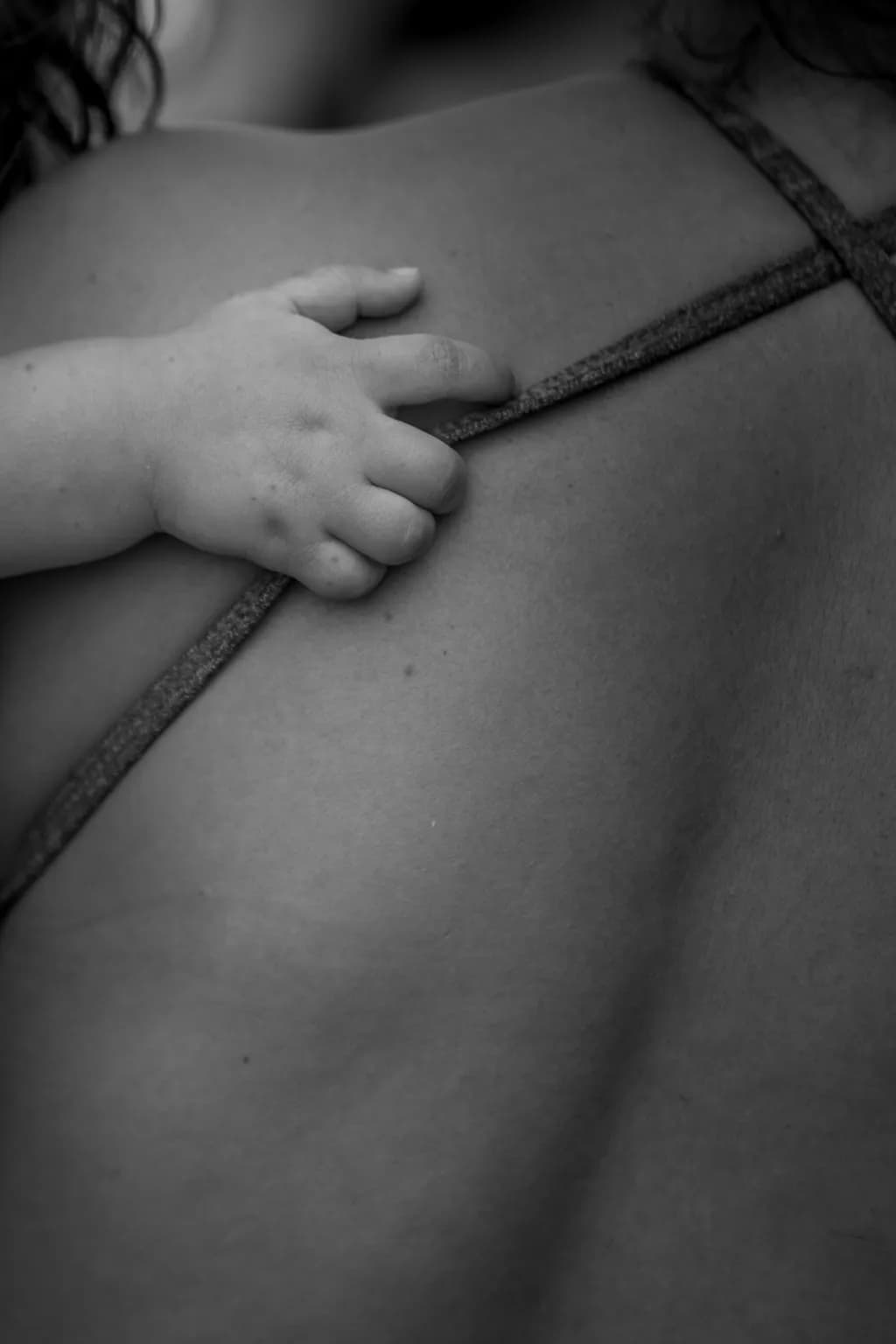 Tender Touch: A Moment of Connection in Black and White Photography