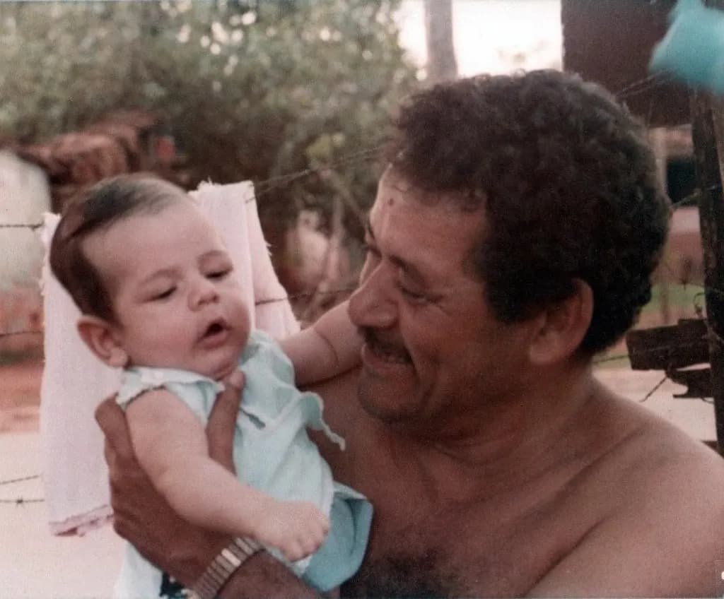 Cherished Moments: A Grandfather's Love for His Grandchild in a Timeless Embrace