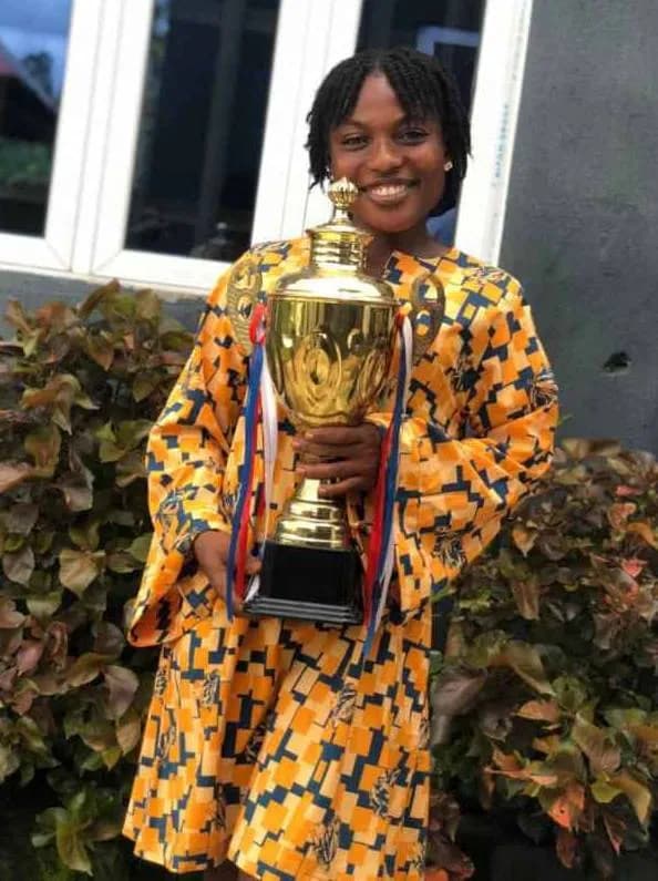 Celebrating Victory: A Joyful Moment of Achievement with a Trophy