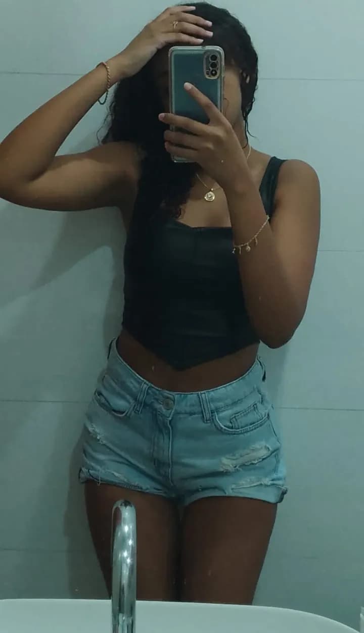 Reflections of Casual Elegance: A Denim Portrait in the Mirror
