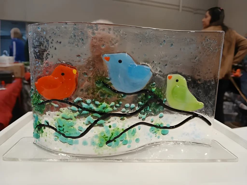 Whimsical Harmony: Colorful Birds on a Glass Canvas