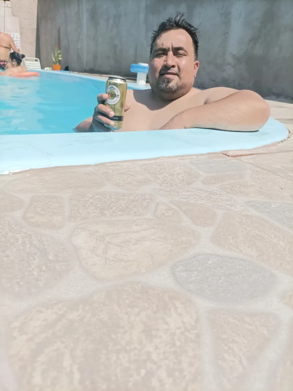 Chill Vibes: A Relaxing Moment by the Poolside with a Cold Brew