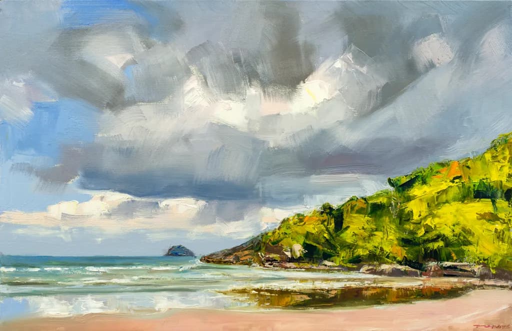 Whispers of the Shore: A Serene Beach Landscape Under Cloudy Skies