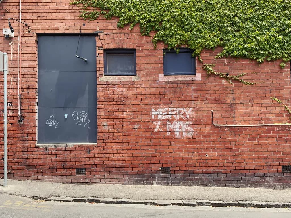 Urban Whispers: A Graffiti Tale on Brick Walls