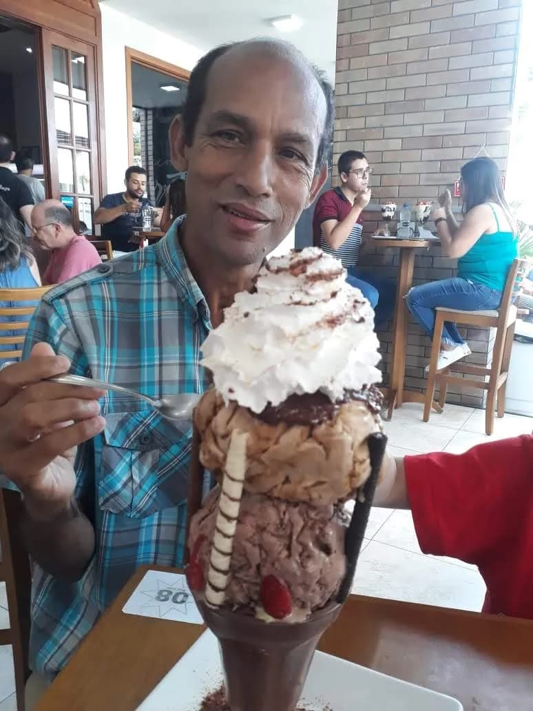 Indulgent Delight: A Sweet Moment Captured with a Towering Ice Cream Treat