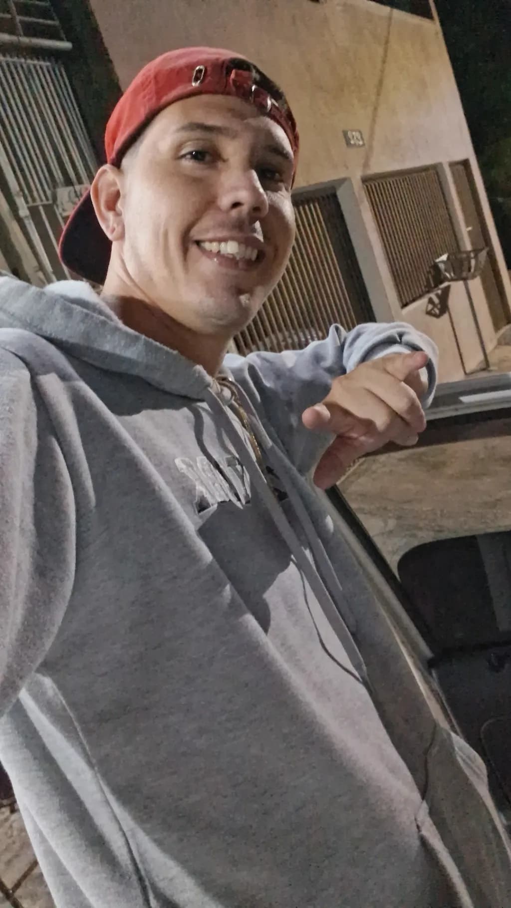 Urban Vibes: A Nighttime Selfie of Joy and Style