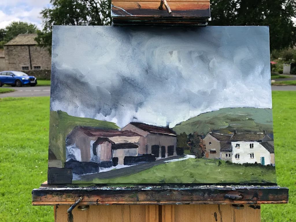 Whispers of a Cloudy Landscape: Serenity Amidst the Greenery and Buildings