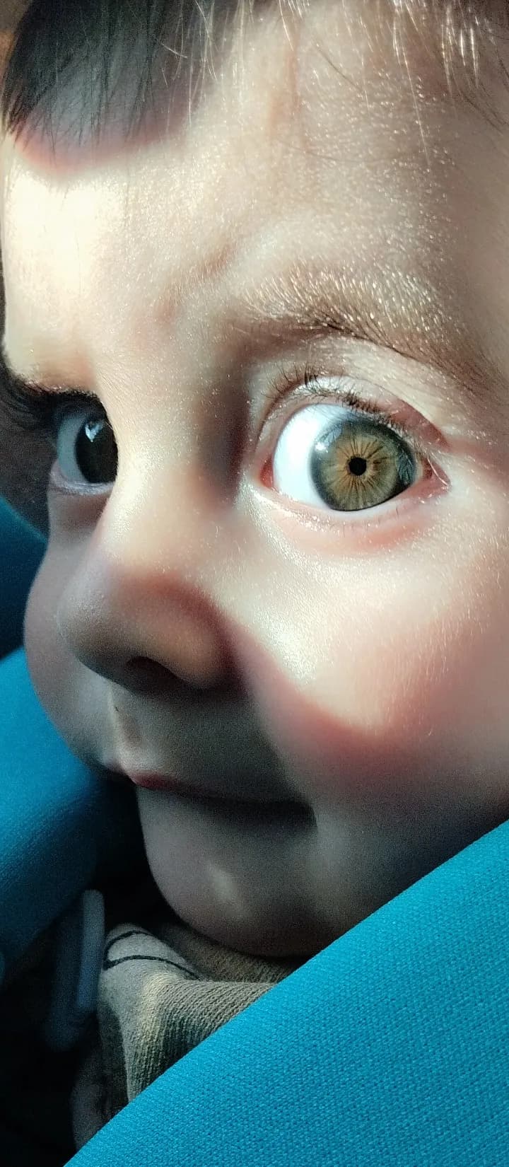 Whimsical Wonder: A Child's Curious Gaze Captured in Playful Light