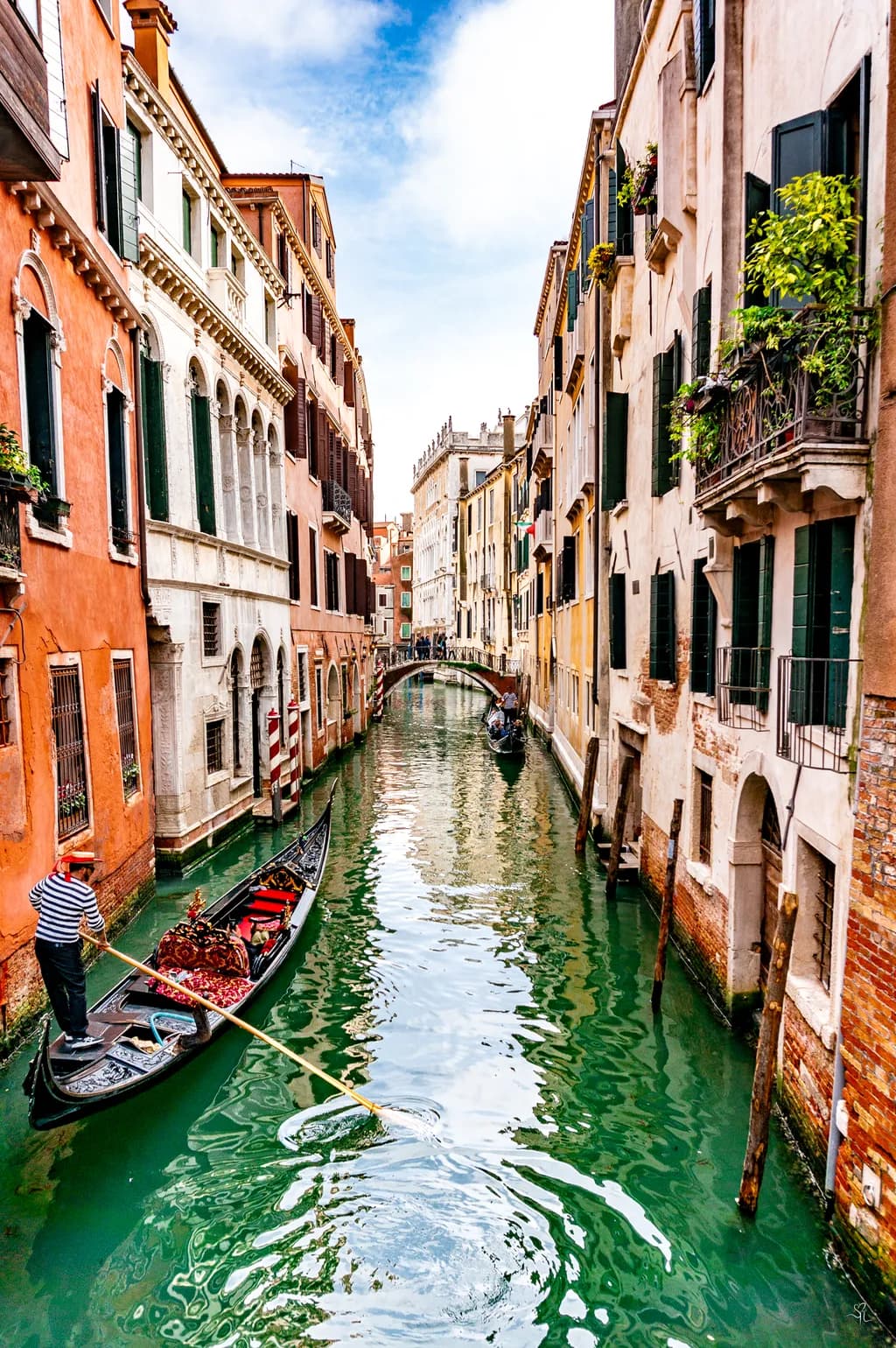 Whispers of Venice: A Serene Gondola Journey Through Colorful Canals