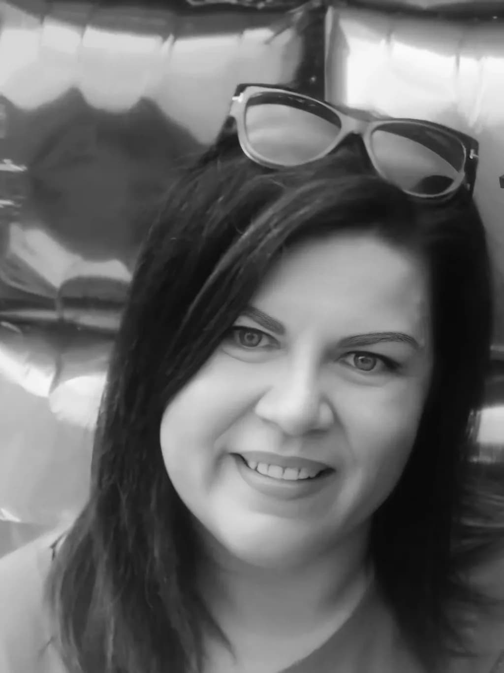 Radiant Reflections: A Portrait of Joy and Confidence in Monochrome