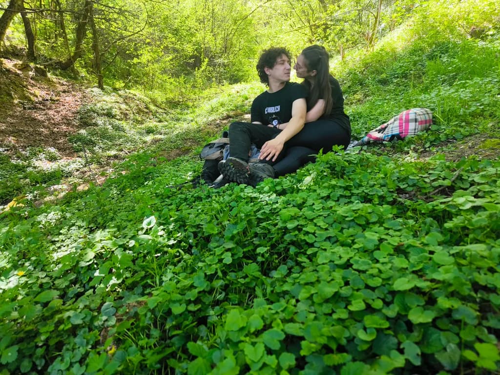Whispers of Love in a Lush Green Haven: A Serene Moment Captured in Nature