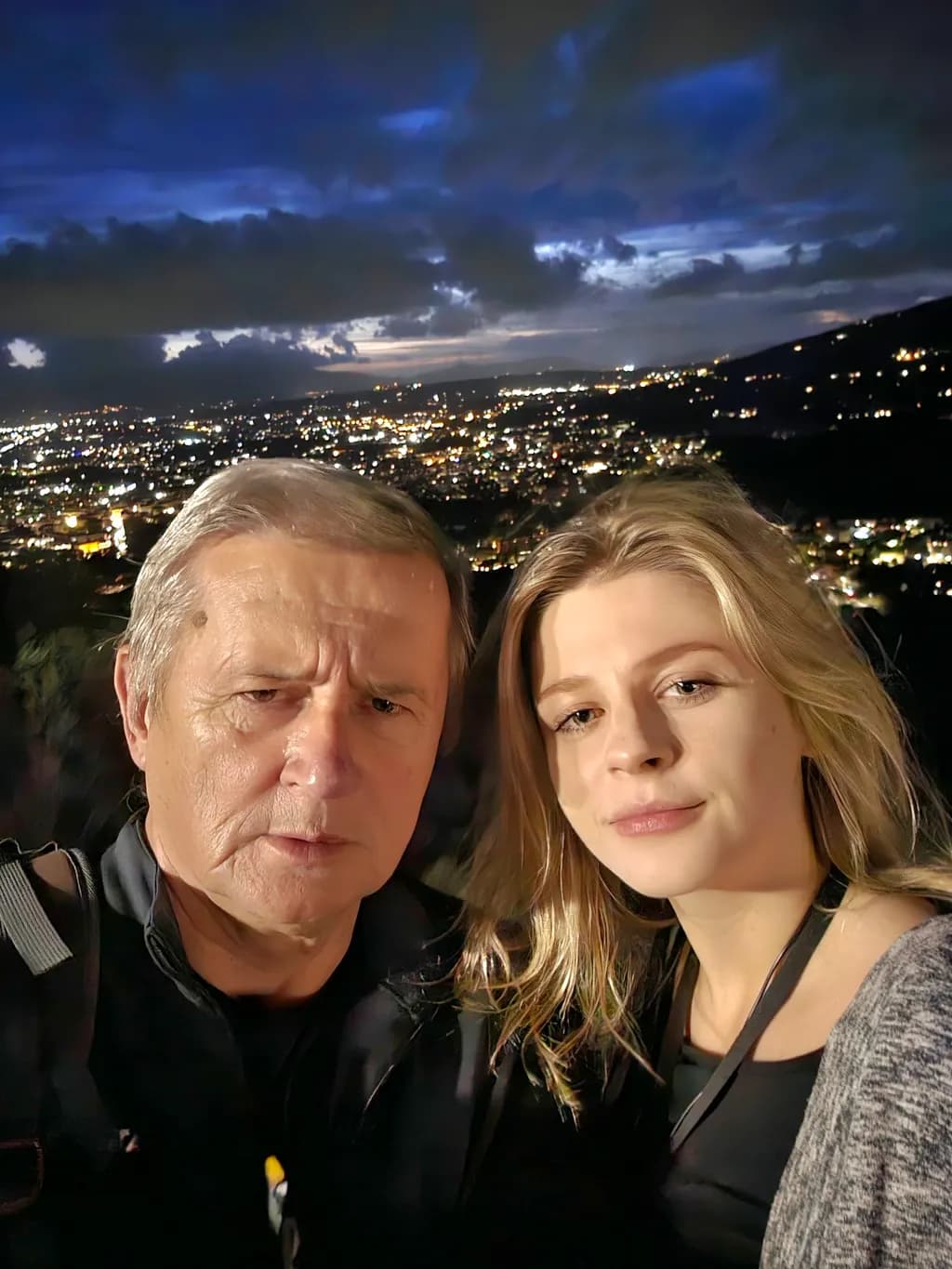 City Lights and Shared Moments: A Nighttime Portrait of Connection