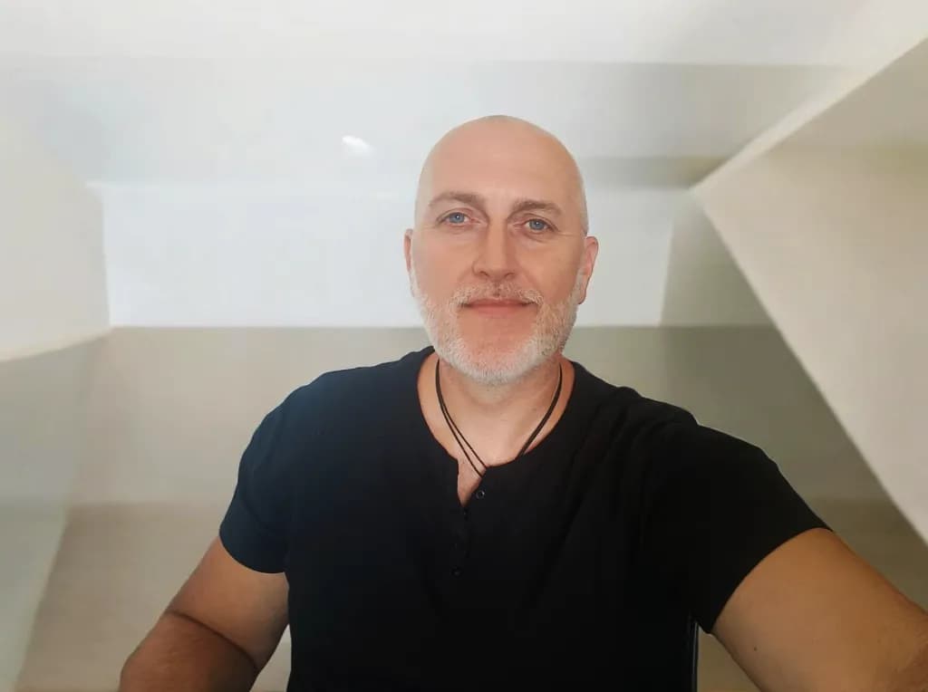 Modern Portrait of a Smiling Man in a Casual Setting