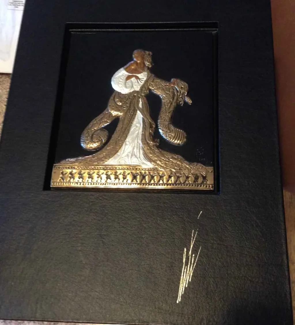 Elegance in Motion: A Captivating Bronze and Gold Relief Sculpture of Graceful Dance
