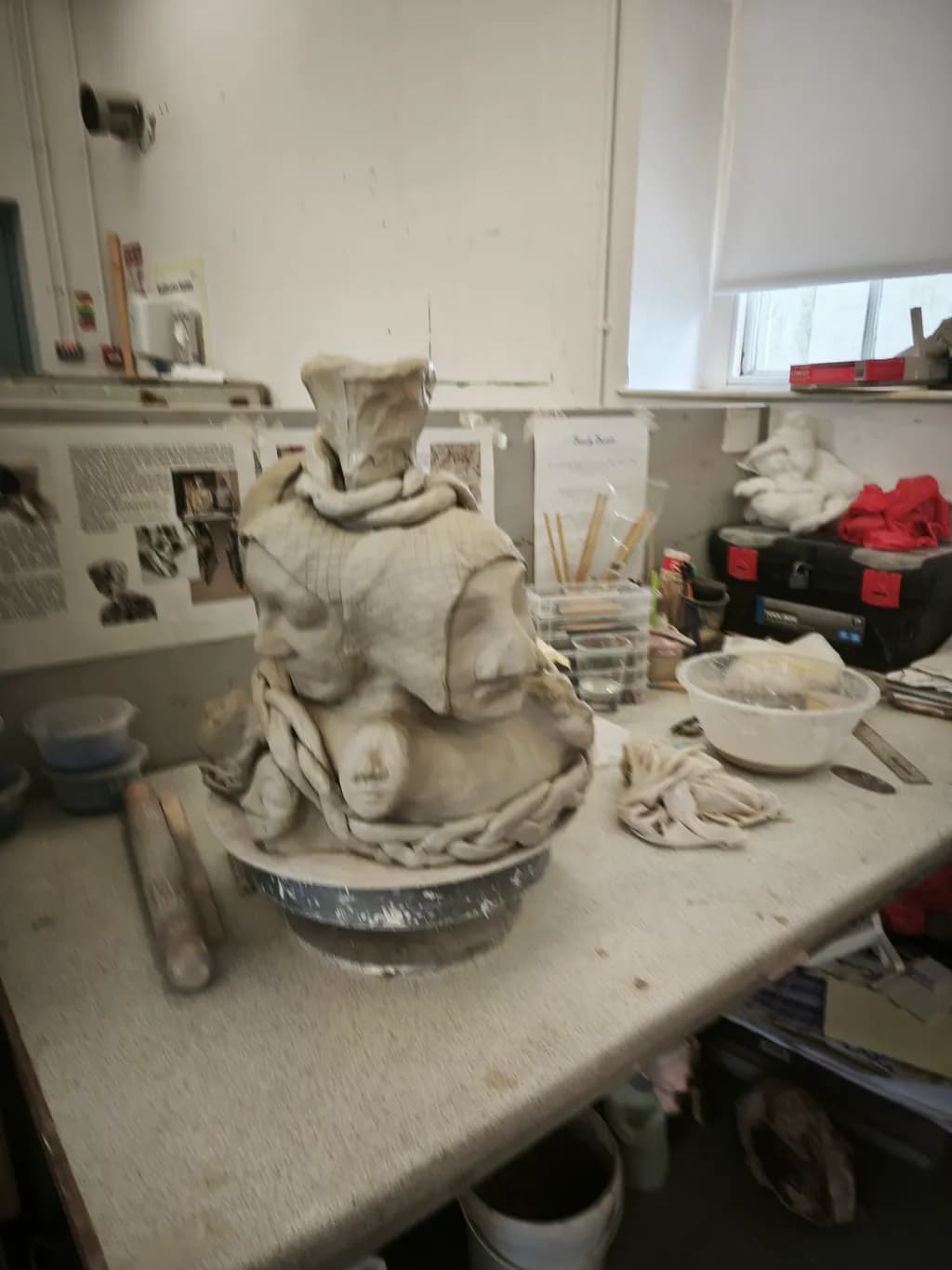 Entwined Faces Sculpture