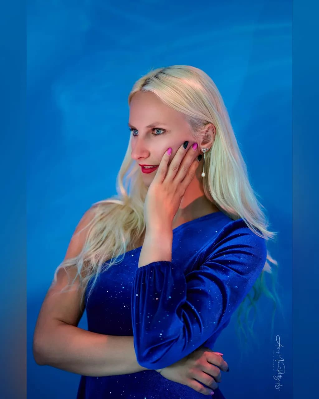Ethereal Elegance: A Portrait of Grace in Blue