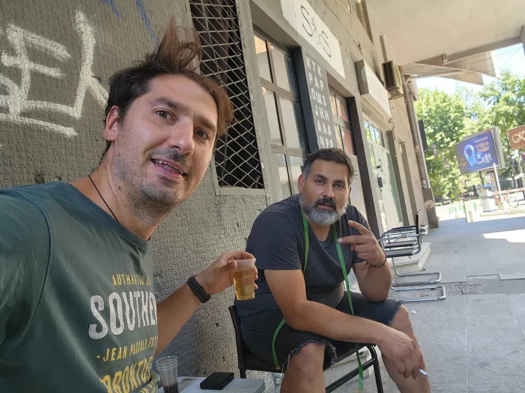 Urban Moments: A Candid Encounter Over Drinks in the City.