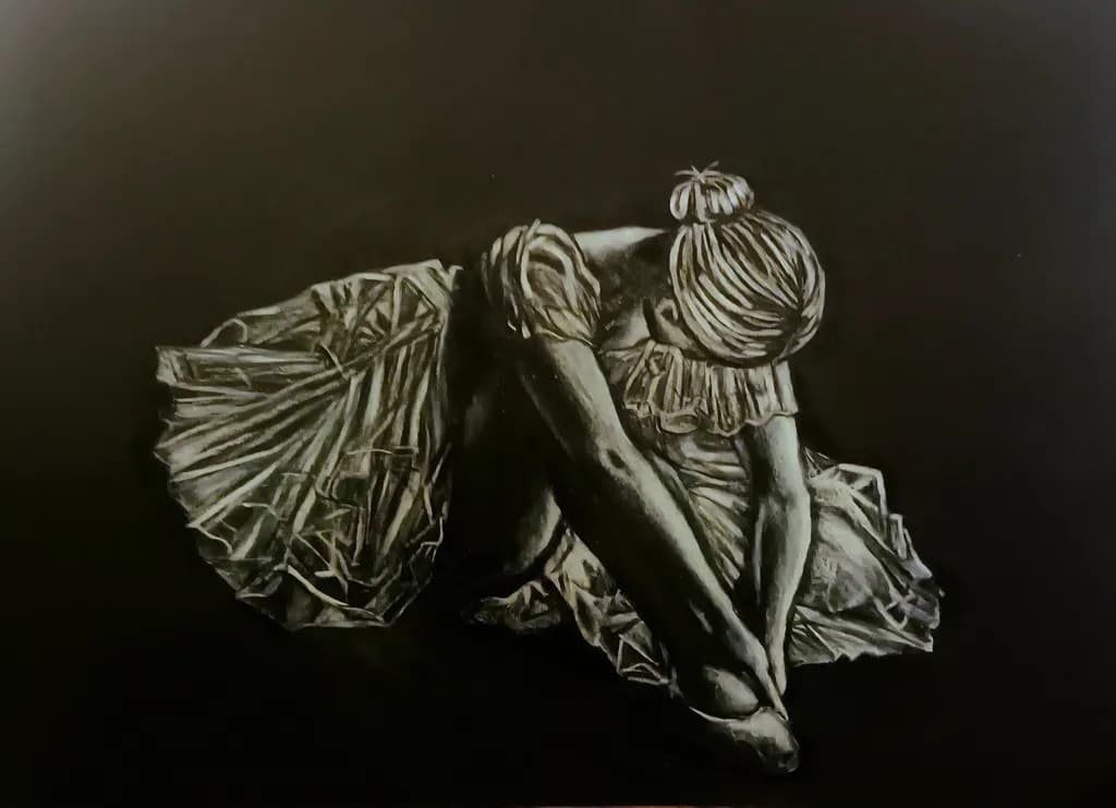 Whispers of Grace: A Monochrome Ballet Dancer in Delicate Pose