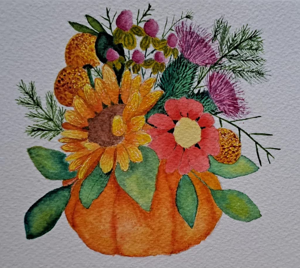 Autumn's Embrace: A Vibrant Floral Arrangement in a Pumpkin Vase
