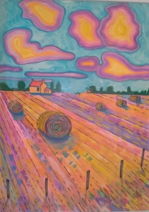 Vibrant Fields Under Dreamy Skies: A Colorful Landscape of Hay Bales and Serenity